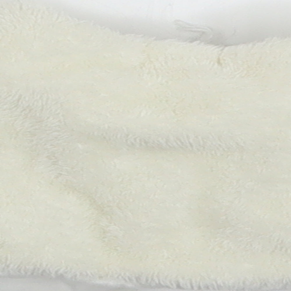 Brand and care label for COCO girls’ white jacket, size 3-6, months
