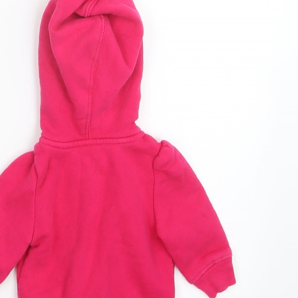 Brand and care label for Gap girls’ pink jacket, size 3-6, months