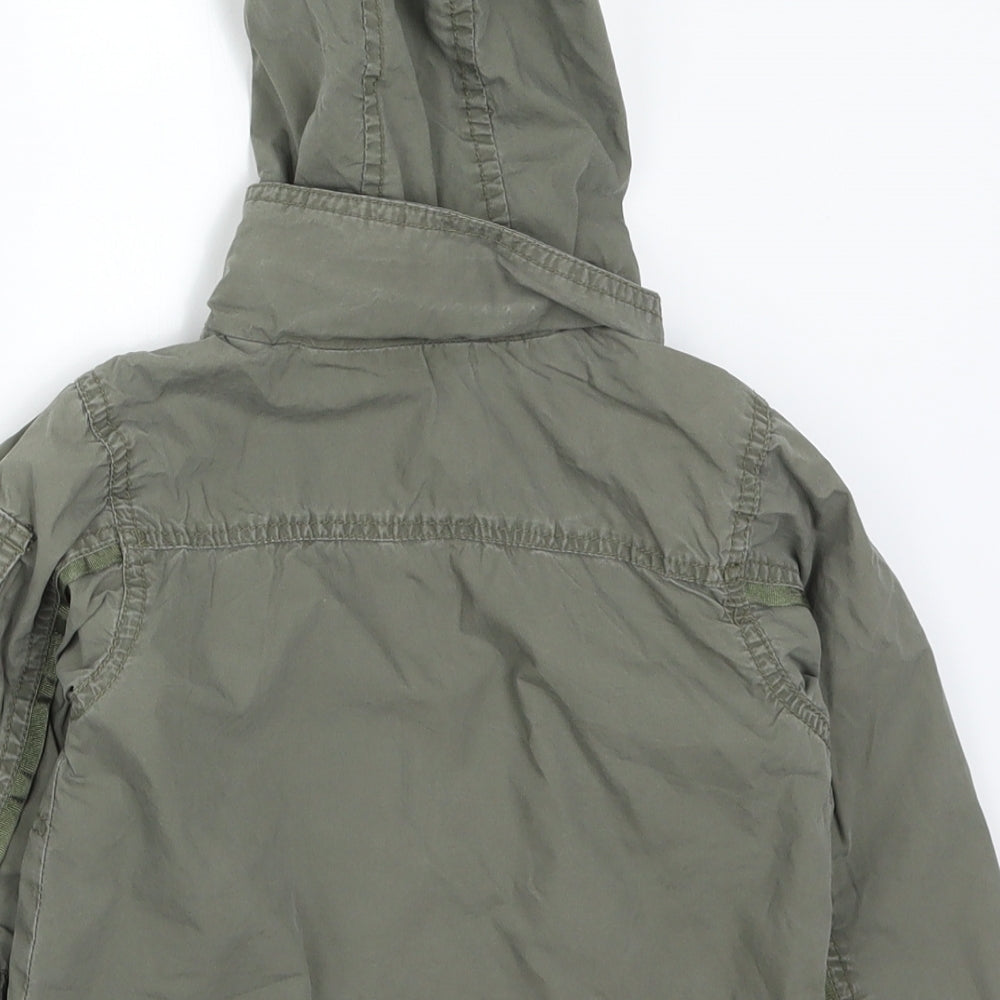 Brand and care label for Mini Mode boys’ green basic coat coat, size 18-24, months