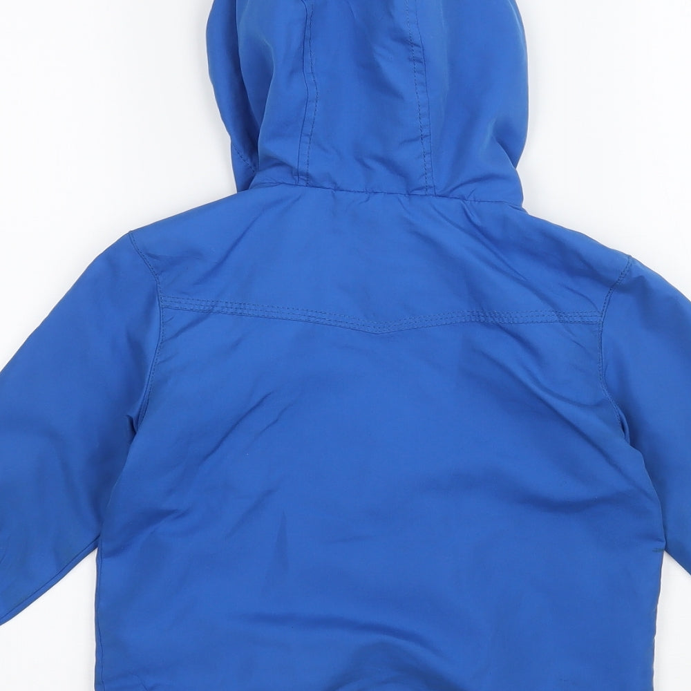 Brand and care label for Kiko & Koko girls’ blue jacket, size 2, years