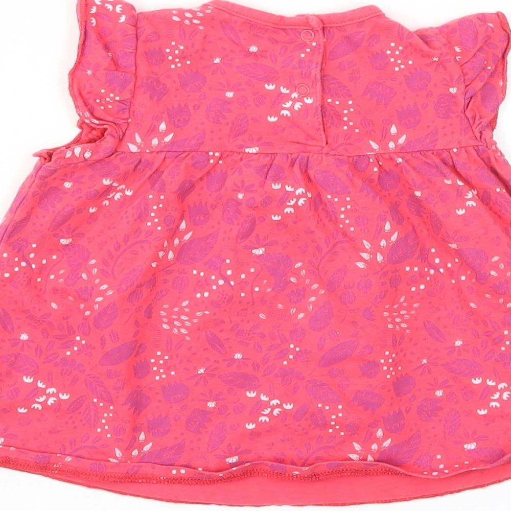 Brand and care label for Preworn girls’ red floral basic t-shirt, size 9-12, months