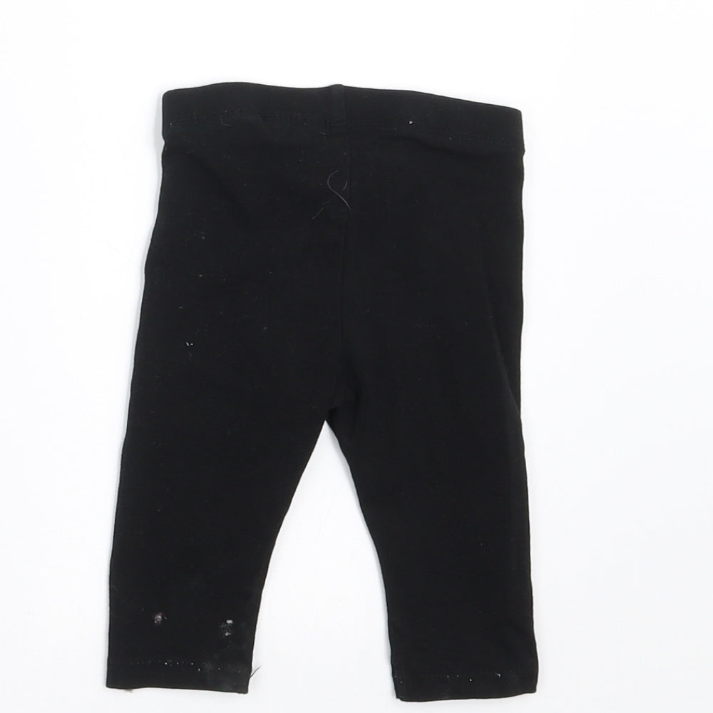 Brand and care label for H&M girls’ black trousers, size 3-6, months - 2-4 months