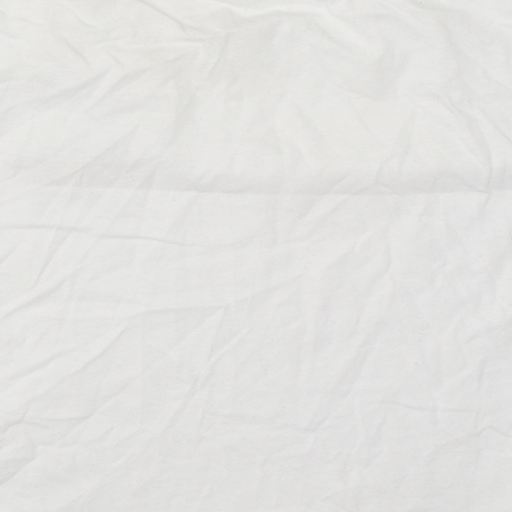 Brand and care label for New Look girls’ white basic t-shirt, size S