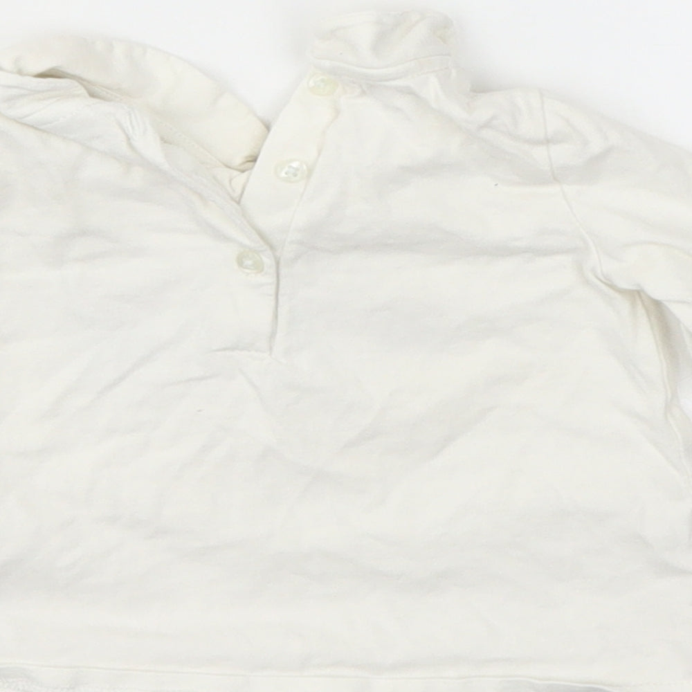 Brand and care label for Next girls’ white camisole t-shirt, size 3-6, months