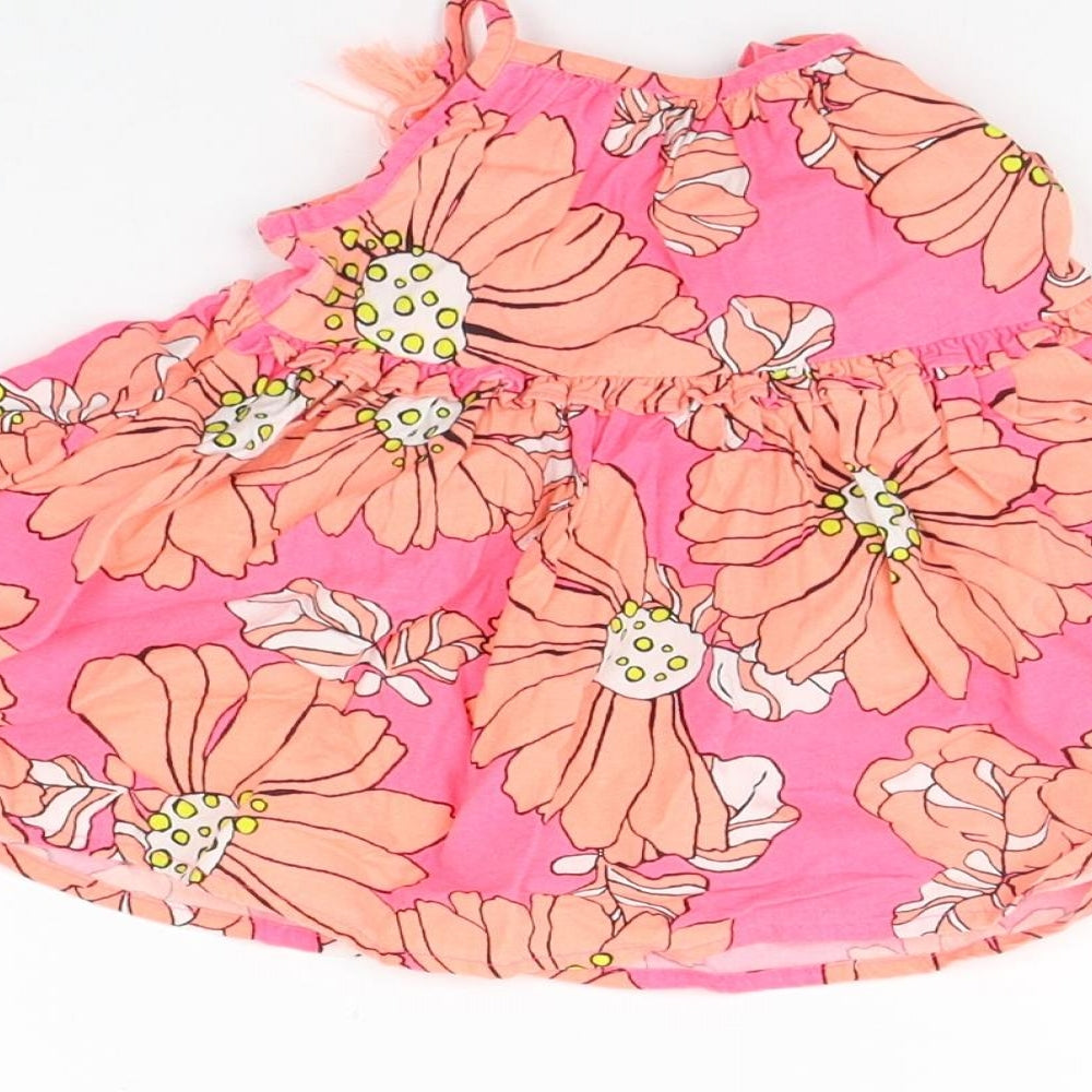 Brand and care label for Next girls’ pink floral a-line, size 3-6, months