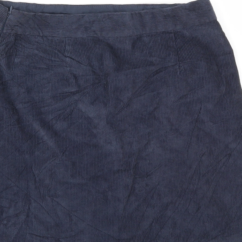 Brand and care label for Falmer Heritage women’s blue a-line skirt, size UK 10
