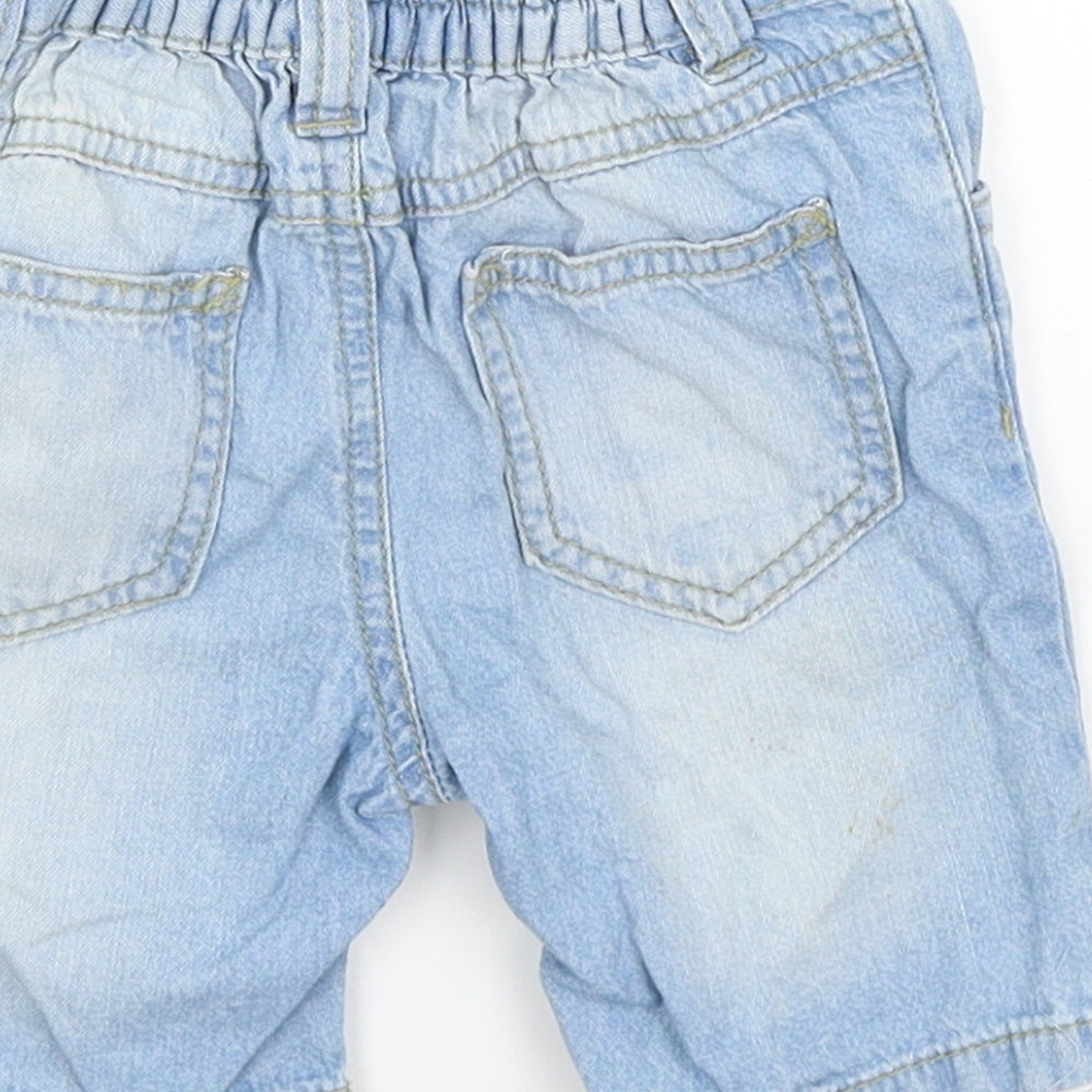 Brand and care label for Little Rebel Baby Blue Cropped Jeans, size 12-18, Months