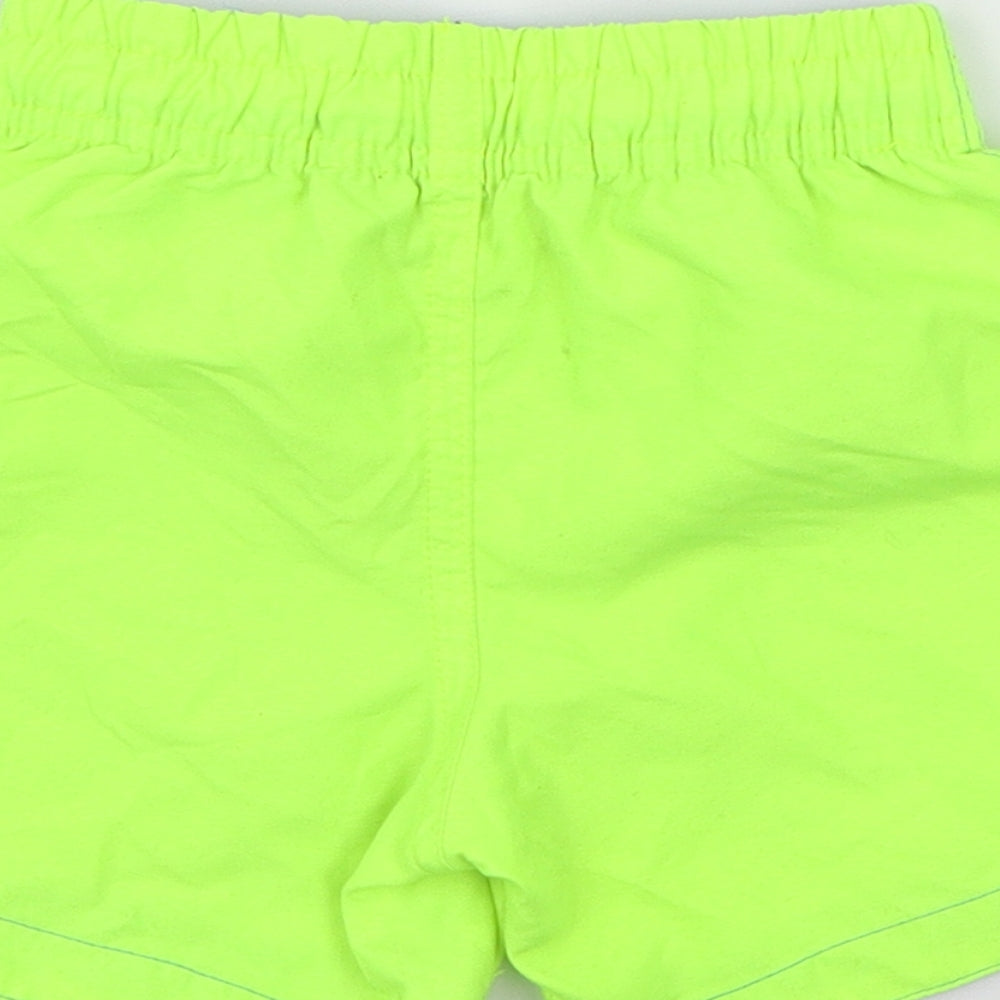 Brand and care label for Rebel boys’ green sweat shorts, size 2-3, years