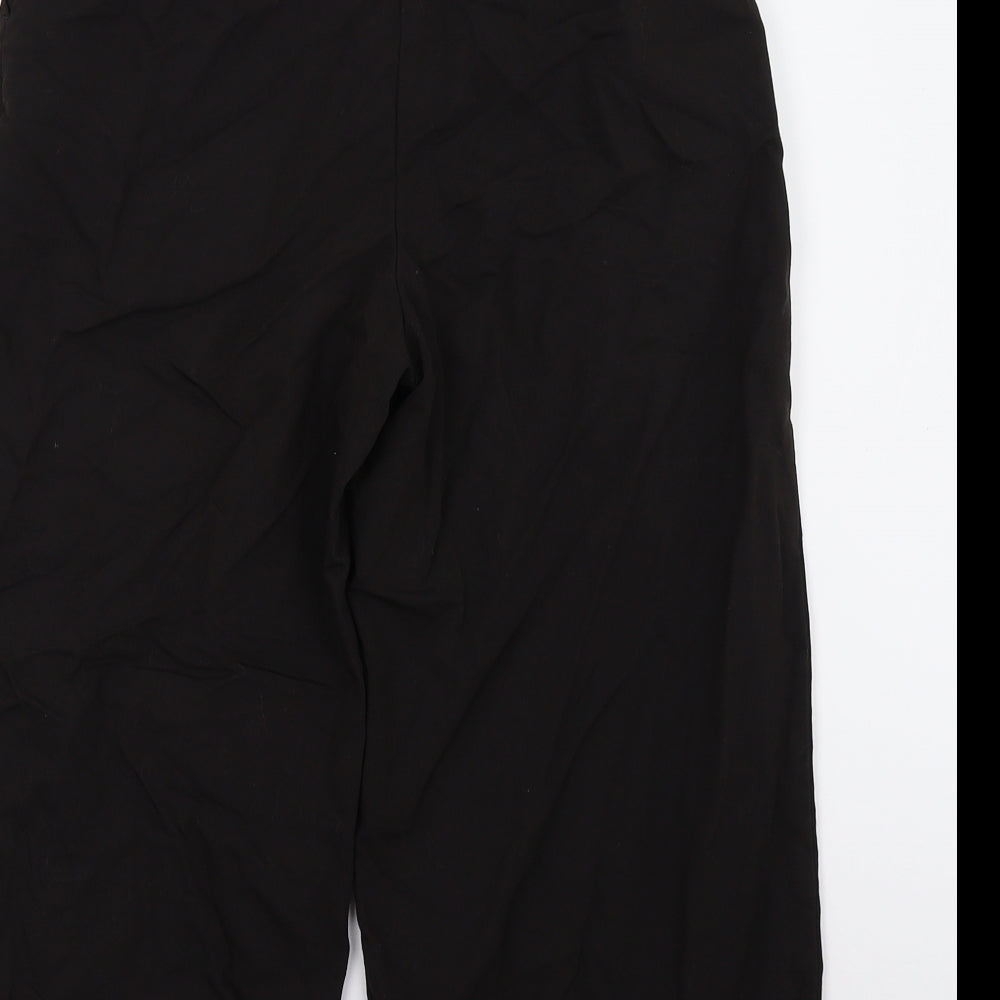 Brand and care label for ASOS women’s black cropped trousers, size UK 6, 23-inch leg