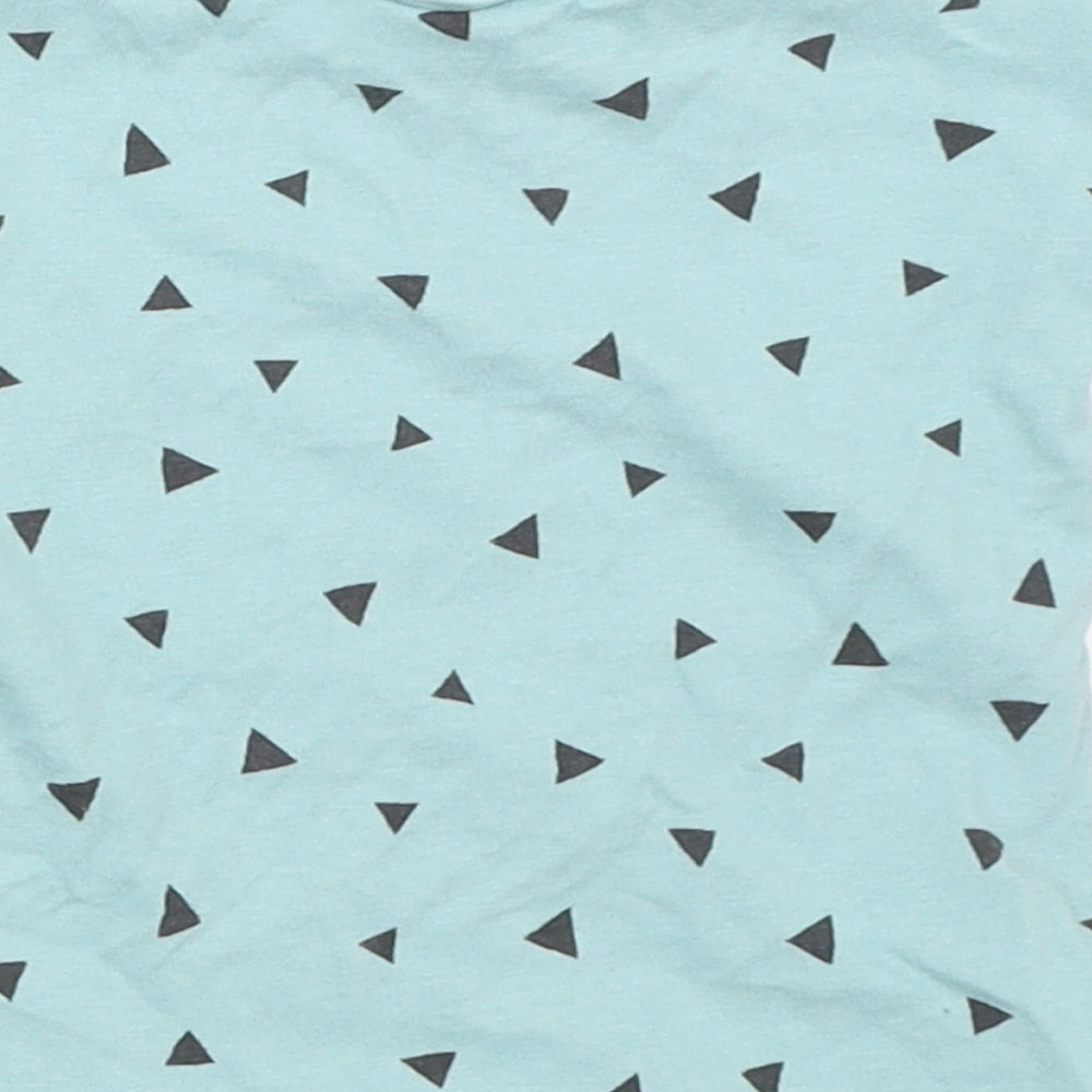 Brand and care label for Next girls’ blue basic t-shirt, size 6-9, months