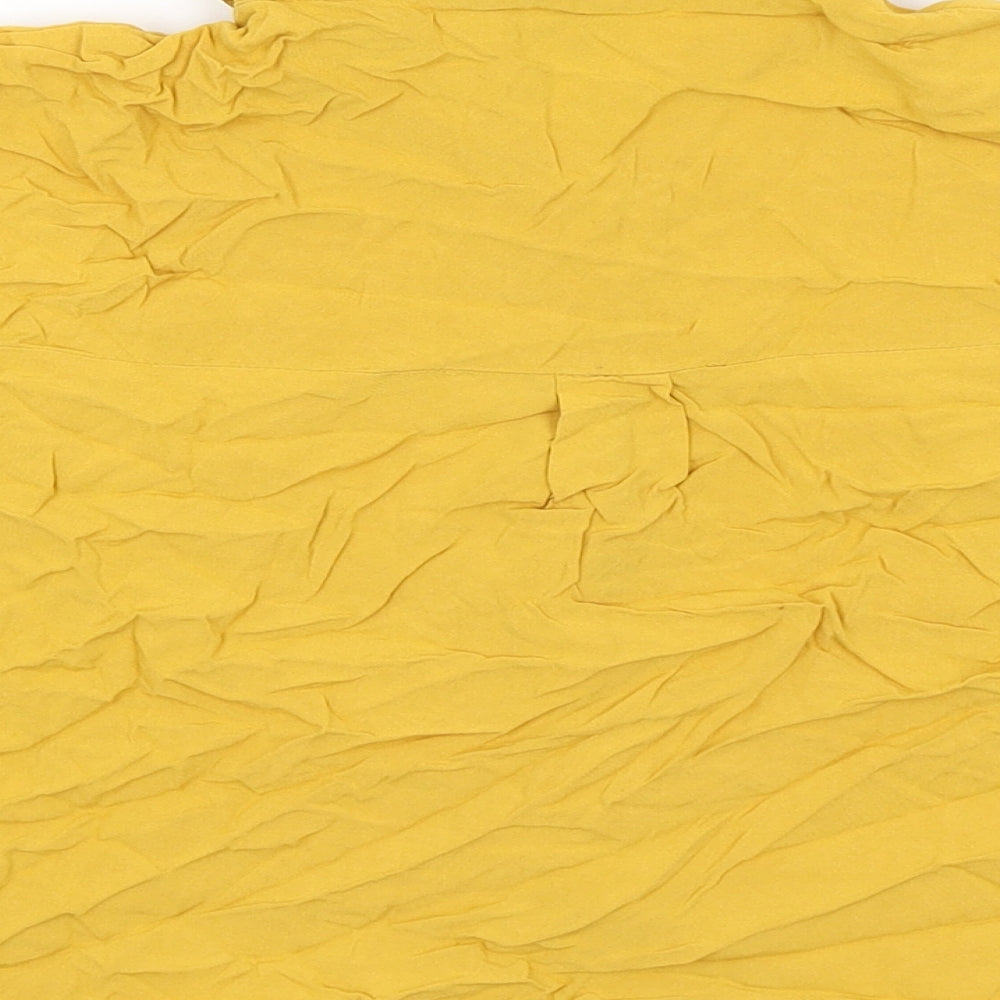 Brand and care label for New Look girls’ yellow cropped button-up, size 12, years