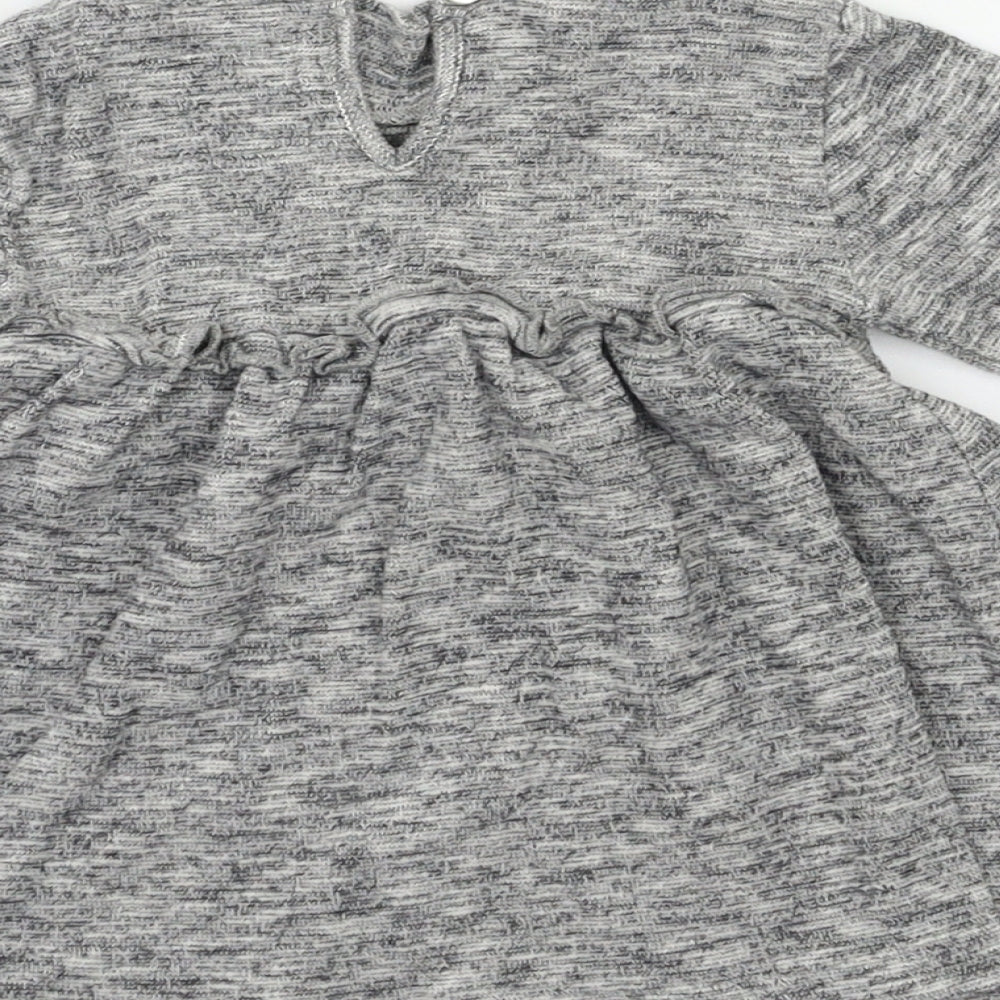 Brand and care label for Next Baby Grey Fit & Flare, size 6-9, Months