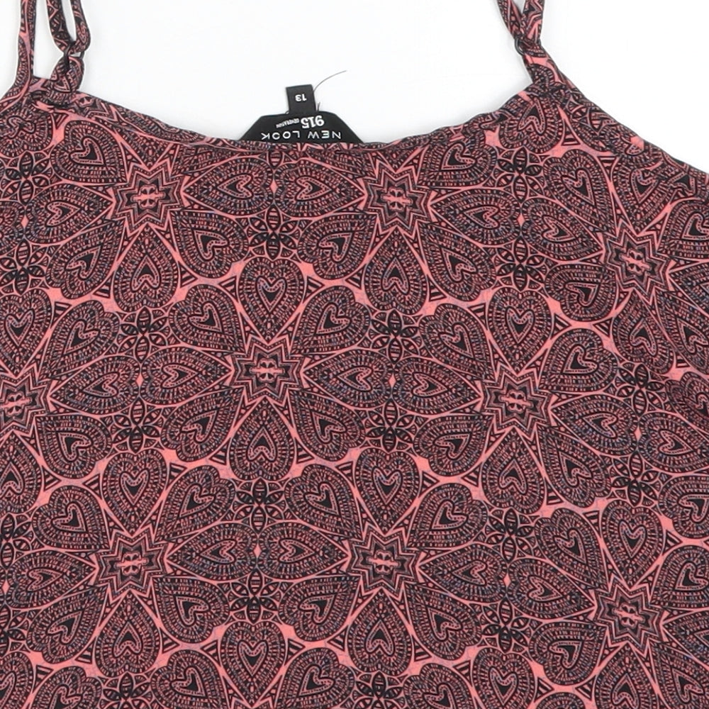 Brand and care label for New Look girls’ pink geometric cropped tank, size 13, years