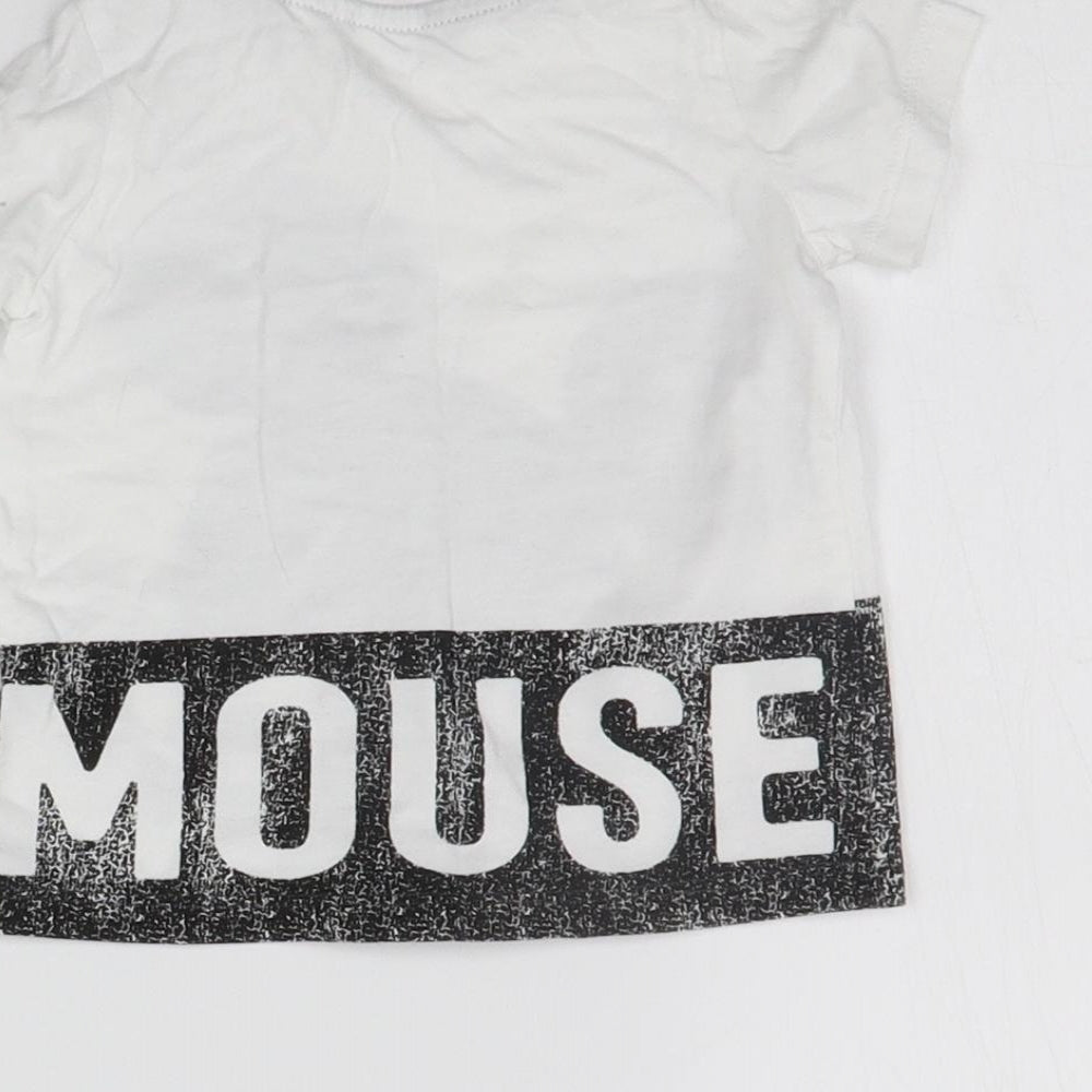 Brand and care label for H&M girls’ white basic t-shirt, size 6-9, months - mickey mouse