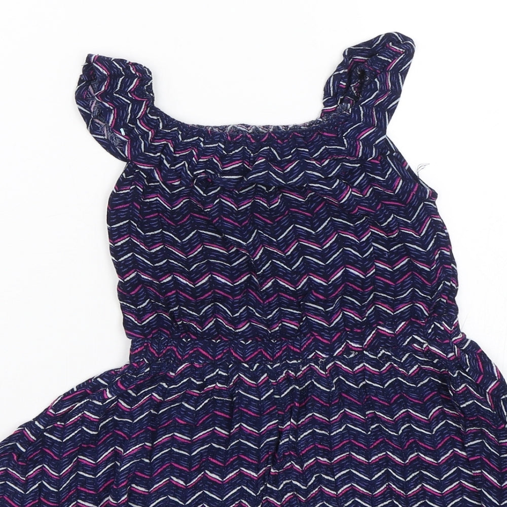 Brand and care label for Young Dimension girls’ blue striped tank dress, size 12-18, months