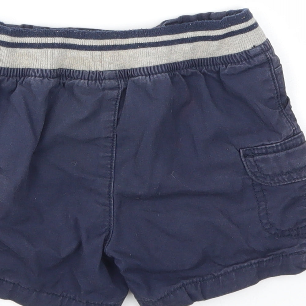 Brand and care label for Matalan boys’ blue capri jeans, size 12-18, months