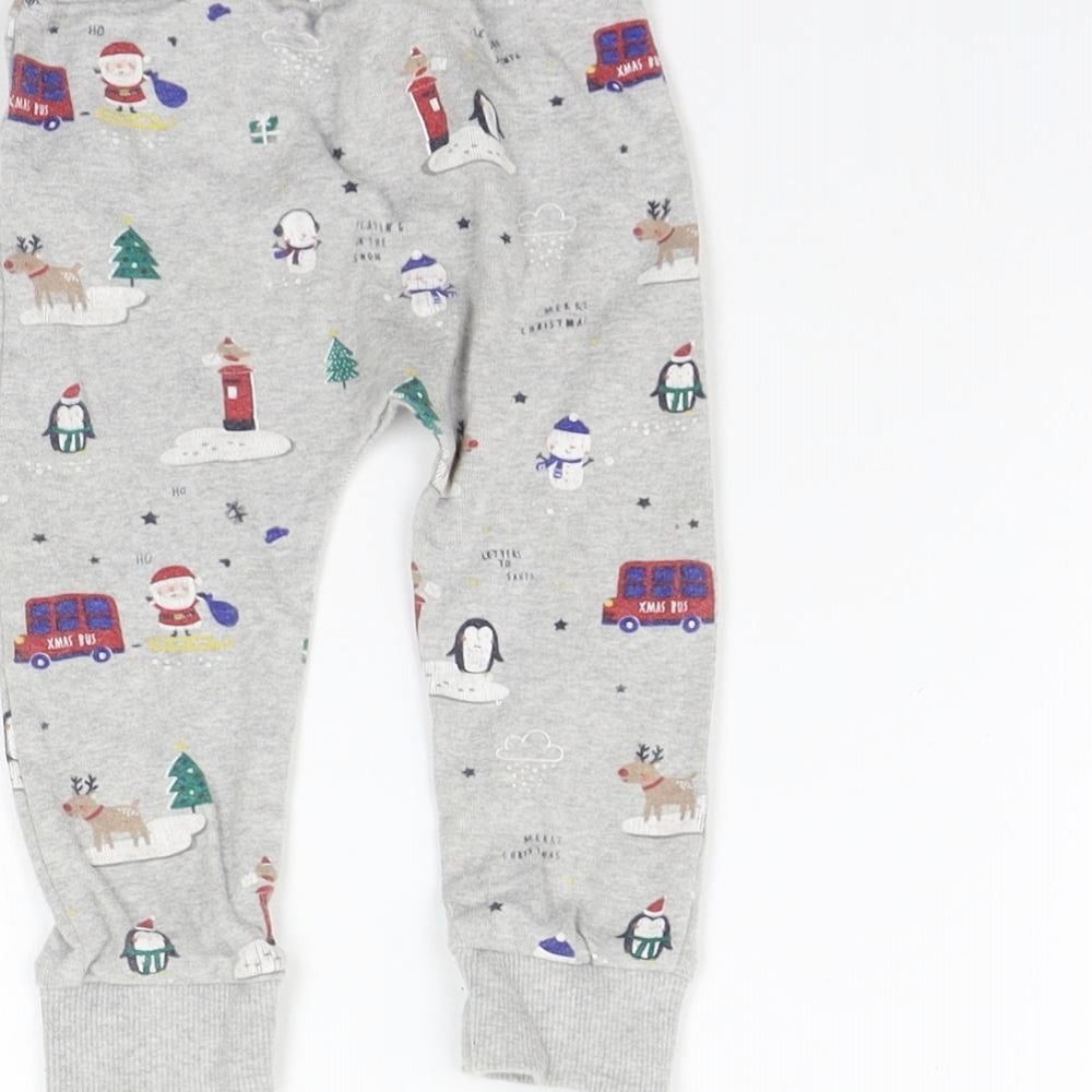 Brand and care label for George girls’ grey geometric jogger trousers, size 9-12, months - washable mark