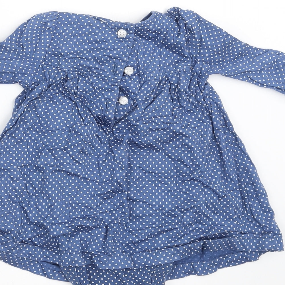 Brand and care label for Mini Club girls’ blue spotted a-line, size 3-6, months - dress bodysuit