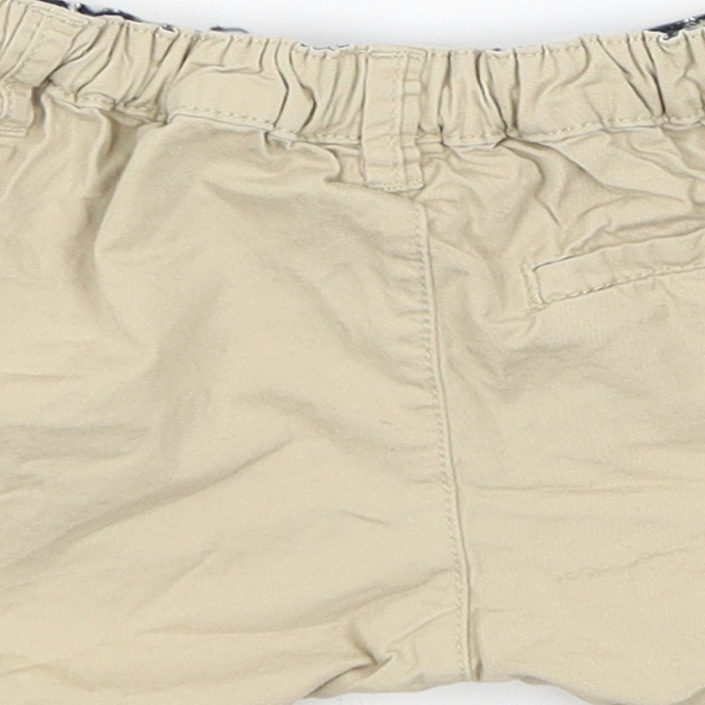 Brand and care label for H&M Baby Beige Cropped Trousers, size 12-18, Months