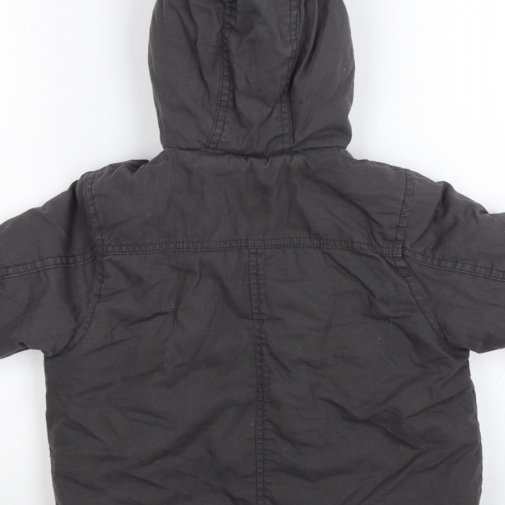 Brand and care label for Mini Club Baby Grey Parka Jacket, size 9-12, Months