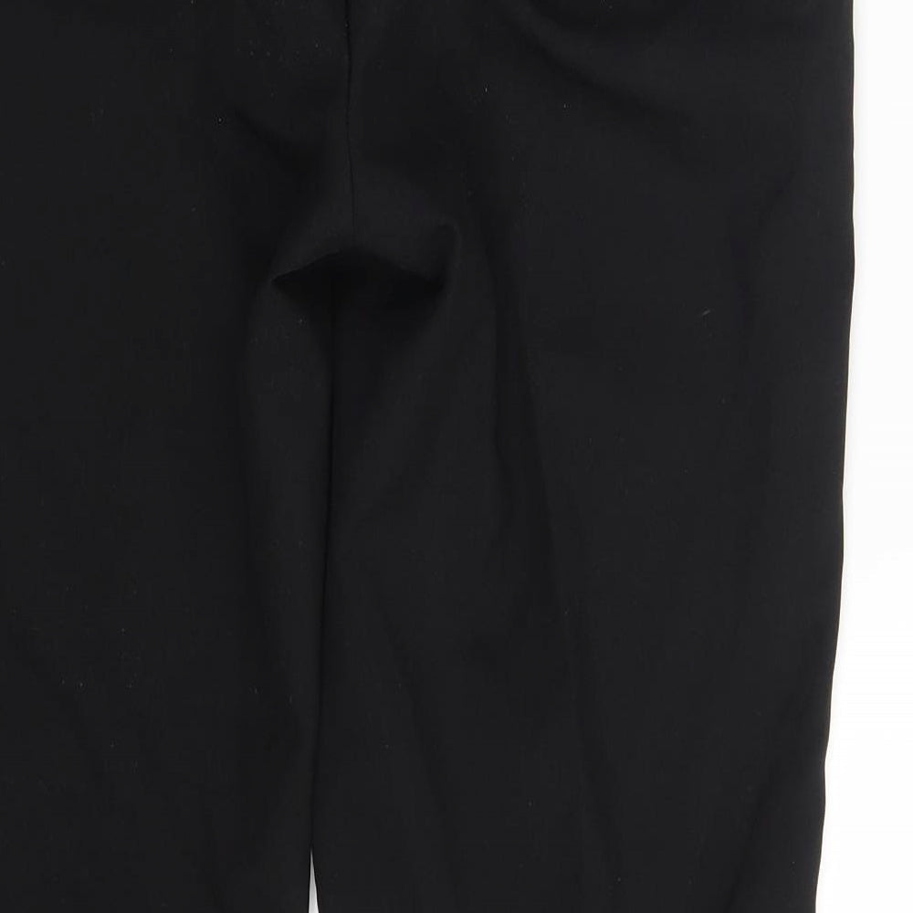Brand and care label for Taylor & Wright men’s black trousers, size 34, in, 25-inch leg