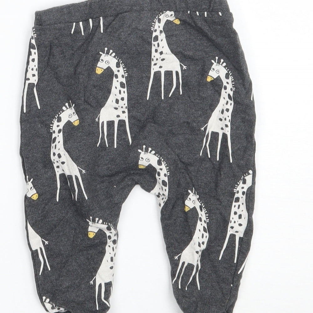 Brand and care label for Next Baby Grey sweatpants, size 3-6, Months