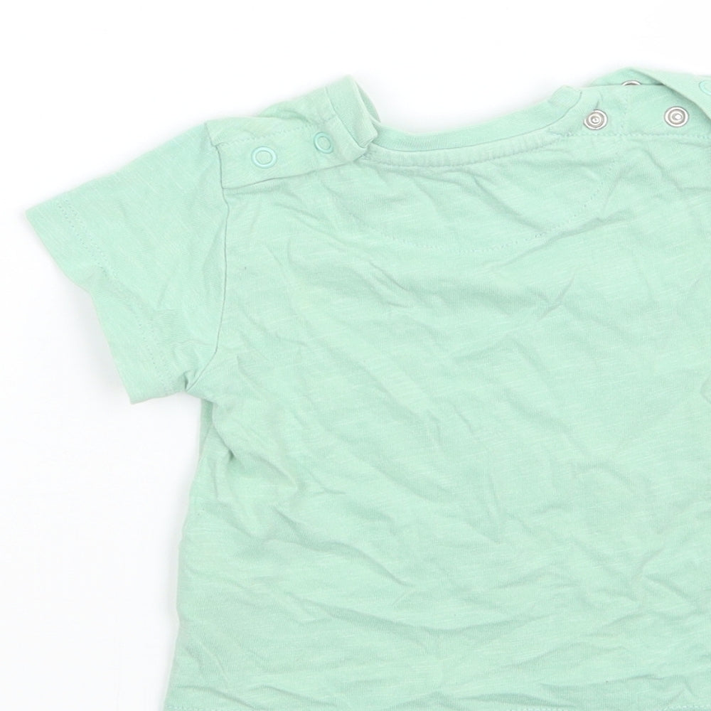 Brand and care label for Marks & Spencer girls’ green basic t-shirt, size 6-9, months