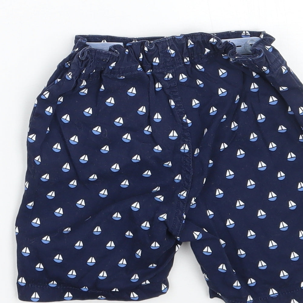 Brand and care label for H&M boys’ blue cropped trousers, size 3-6, months