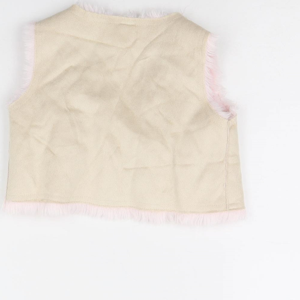 Brand and care label for Mini Mode girls’ beige jacket, size 9-12, months