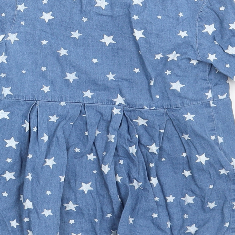Brand and care label for Very girls’ blue shirt dress, size 12-18, months