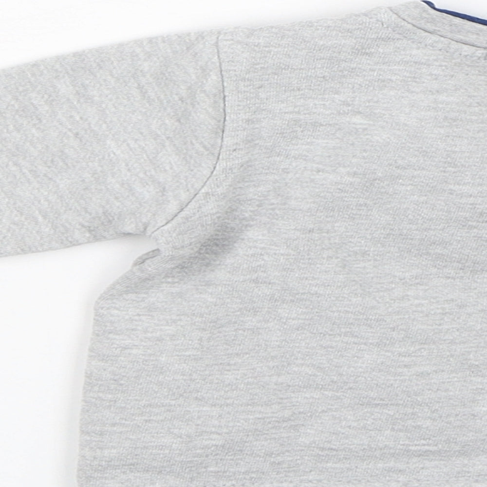 Brand and care label for Ergee Baby Grey jumper, size 6-9, Months - Seal