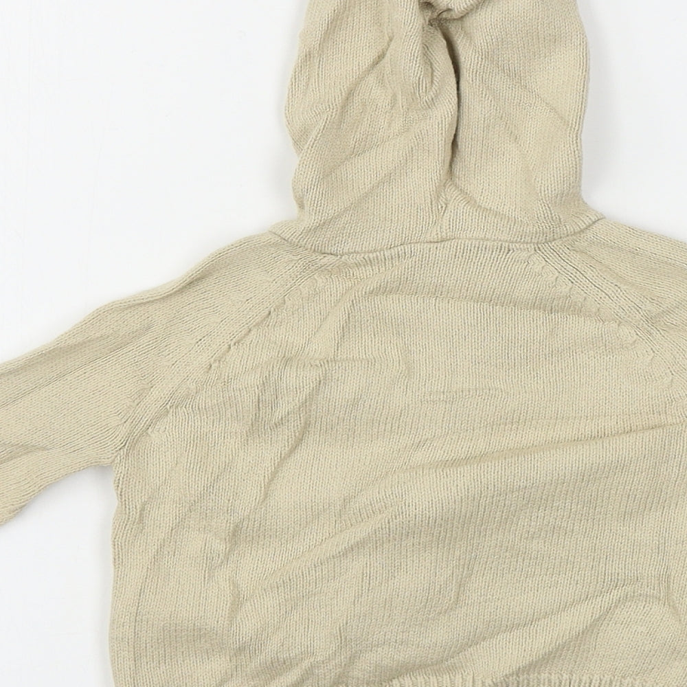 Brand and care label for Preworn boys’ beige jacket, size 6-9, months