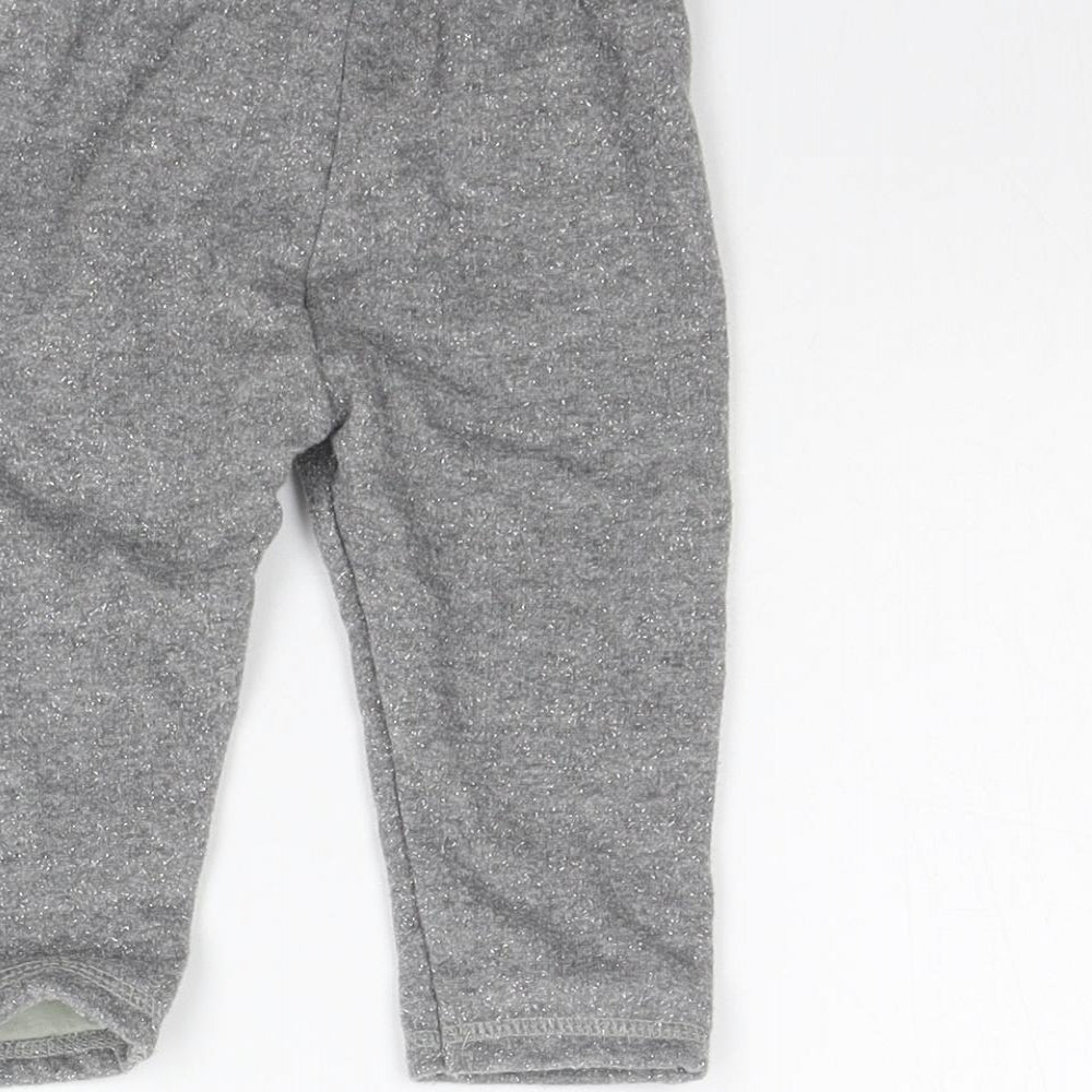 Brand and care label for George girls’ grey jogger trousers, size 6-9, months