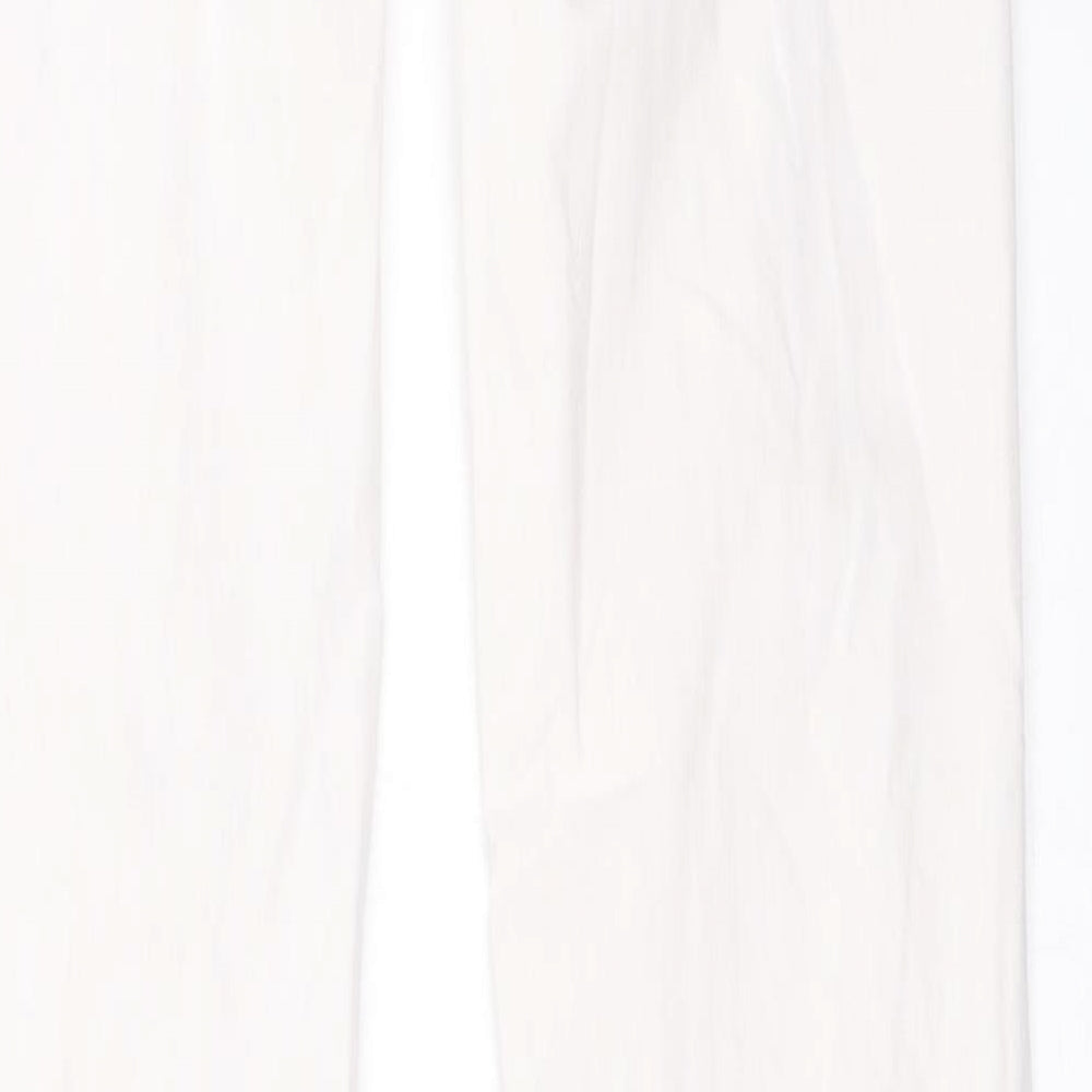 Brand and care label for FC Jeans women’s white denim skinny jeans, size UK 12, 32-inch leg