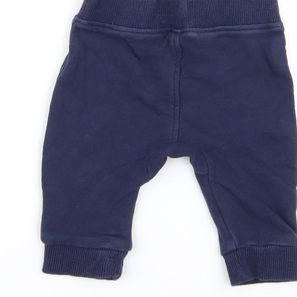 Brand and care label for Asda George boys’ blue jogger trousers, size 0-3, months