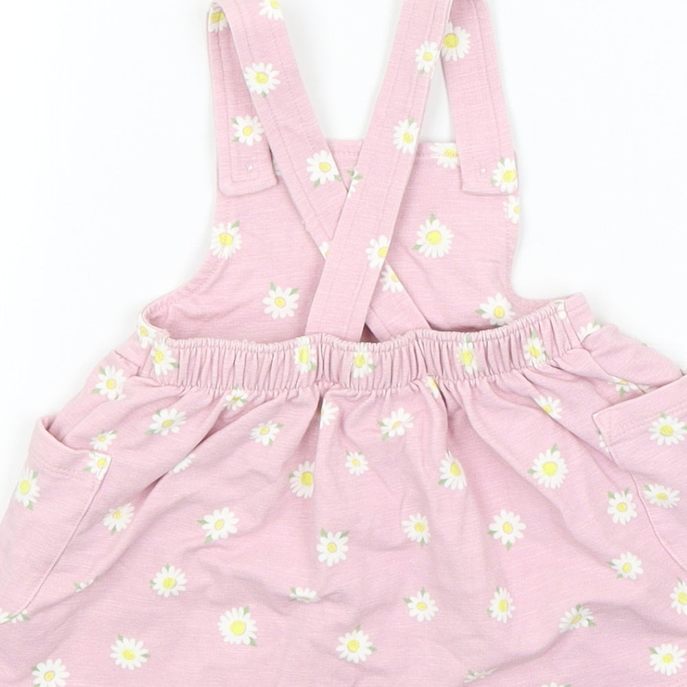 Brand and care label for Nutmeg Baby Pink Floral Pinafore/Dungaree Dress, size 3-6, Months