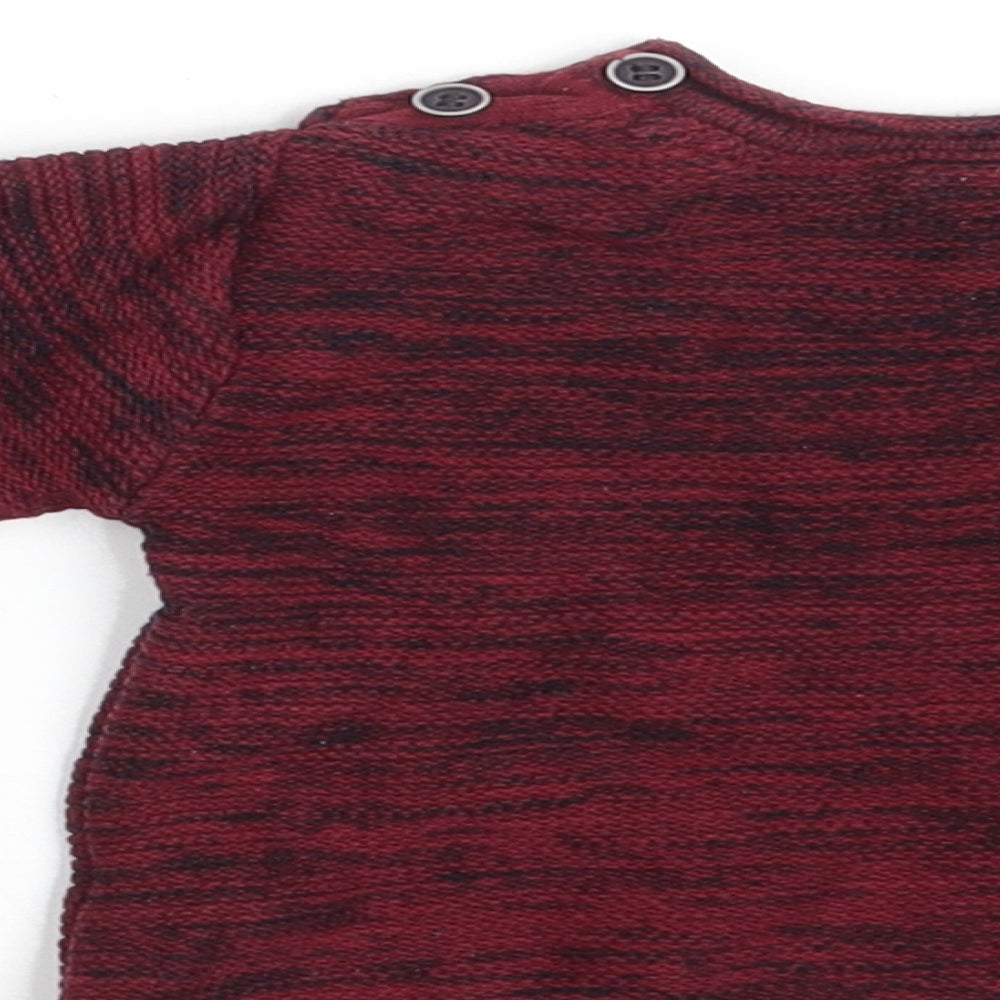 Brand and care label for Primark boys’ purple jumper, size 12-18, months