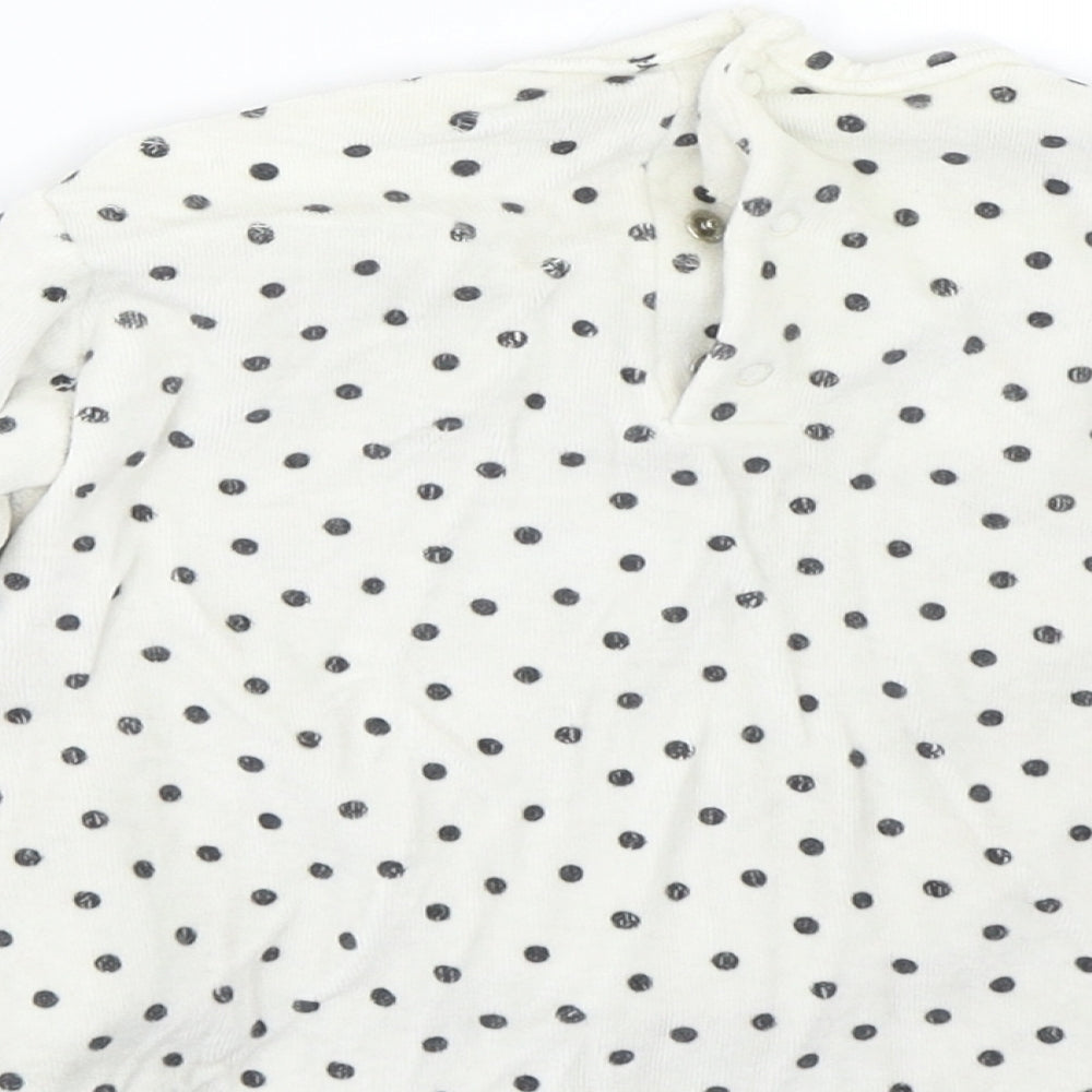 Brand and care label for Preworn Baby White Spotted jumper, size 24, Months - Cat