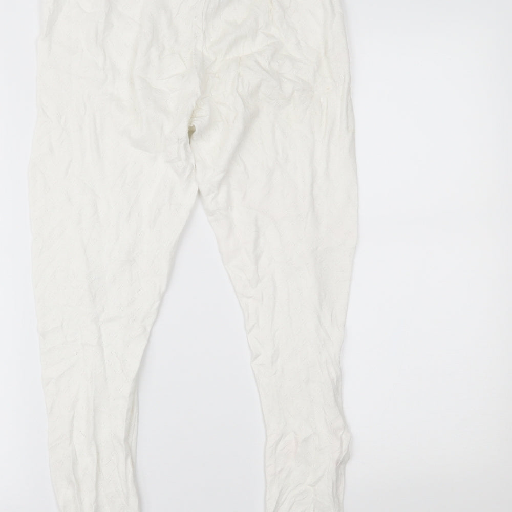 Brand and care label for ASOS women’s white jeans, size UK 10, 22-inch leg