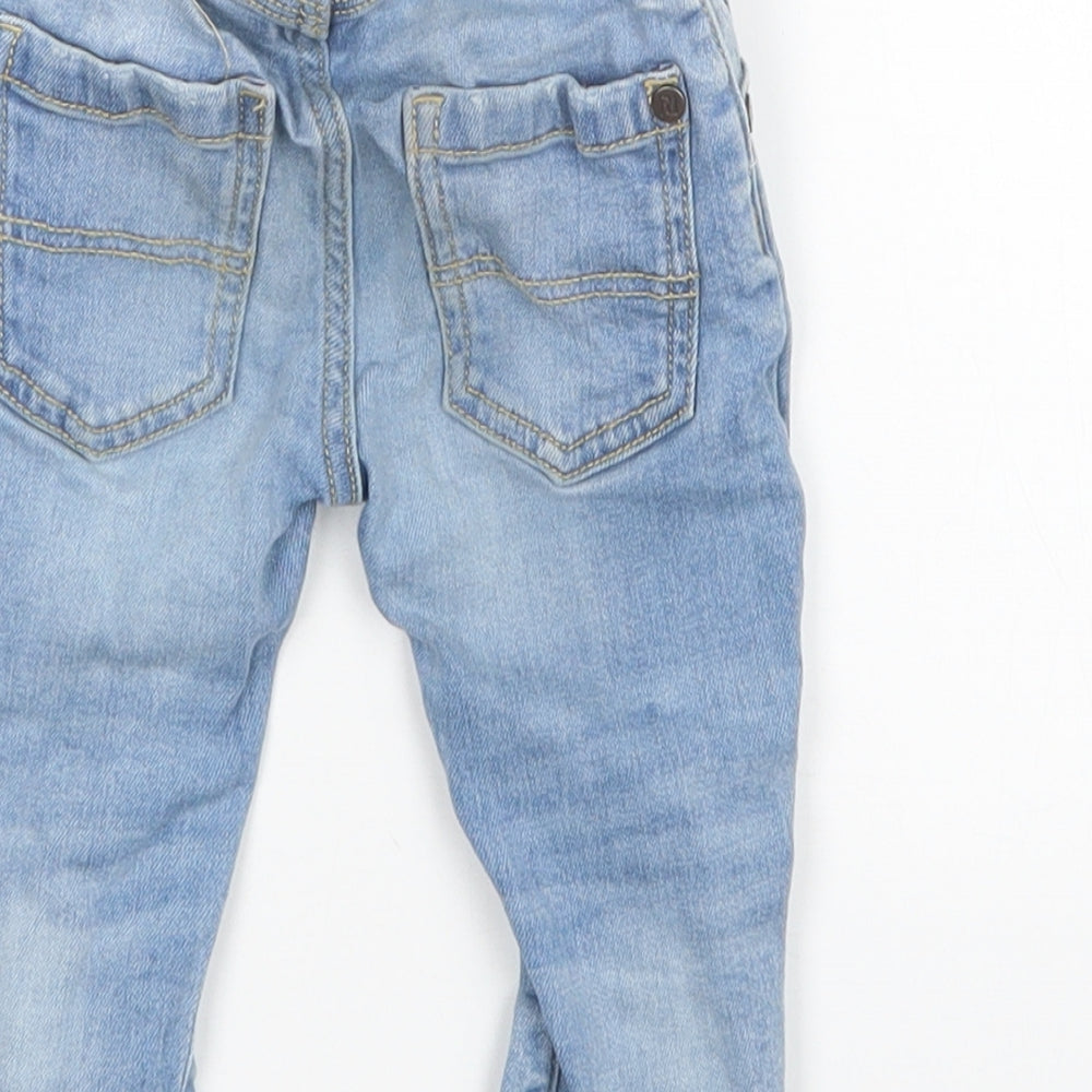 Brand and care label for Preworn Baby Blue Jeans, size 6-9, Months