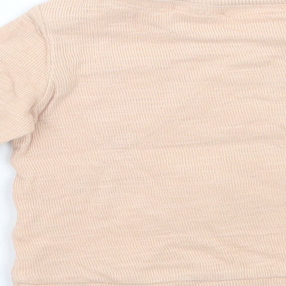Brand and care label for The lion king Baby Beige jumper, size 0-3, Months
