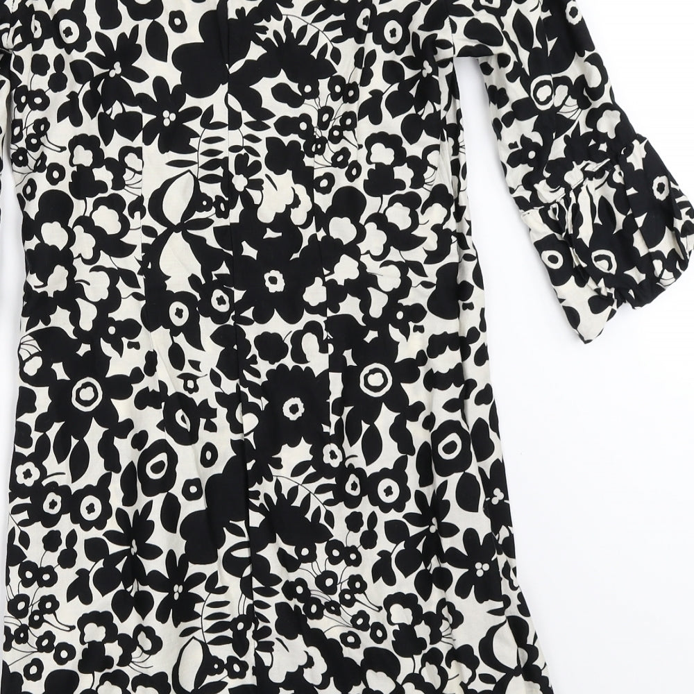 Brand and care label for Atmosphere women’s black floral shift, size UK 8