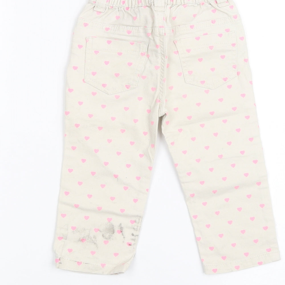 Brand and care label for Young Dimension Baby White Jeans, size 18-24, Months