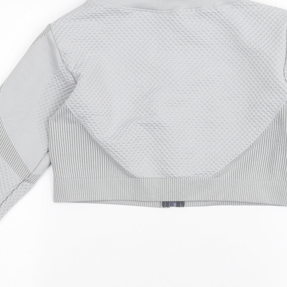 Brand and care label for Preworn girls’ grey jacket, size L