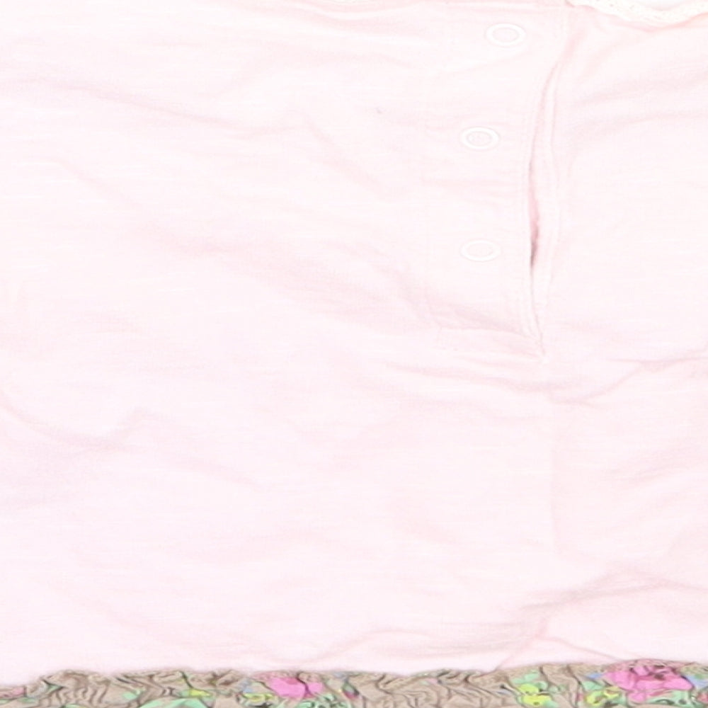 Brand and care label for Next girls’ pink floral basic t-shirt, size 3-6, months