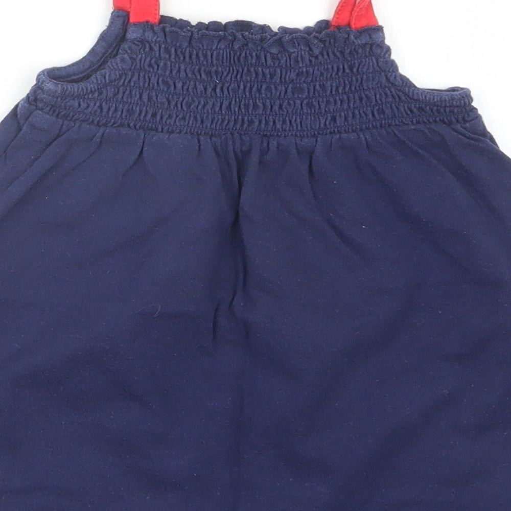 Brand and care label for Marks & Spencer girls’ blue t-shirt dress, size 9-12, months