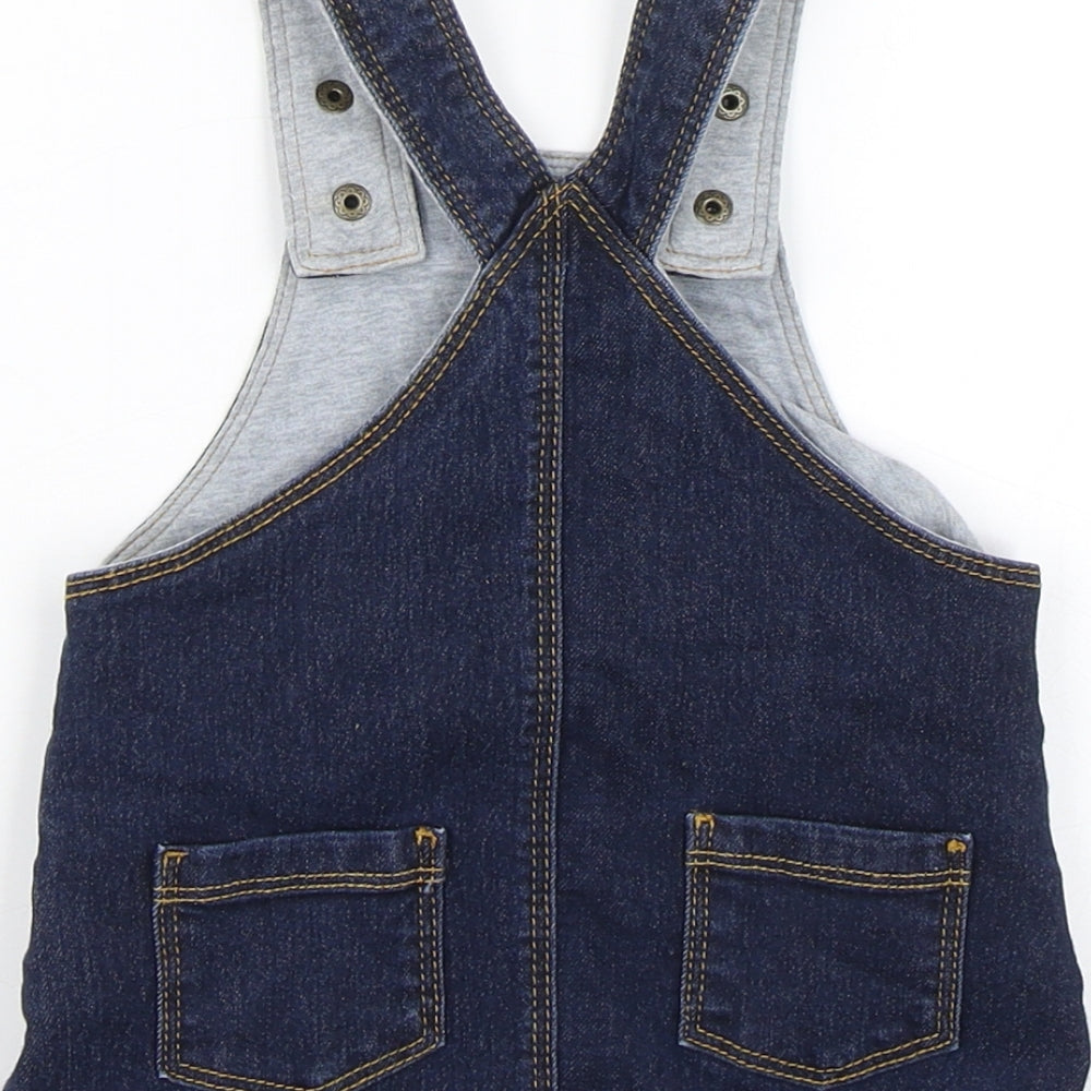 Brand and care label for Marks & Spencer girls’ blue denim pinafore/dungaree dress, size 3-6, months