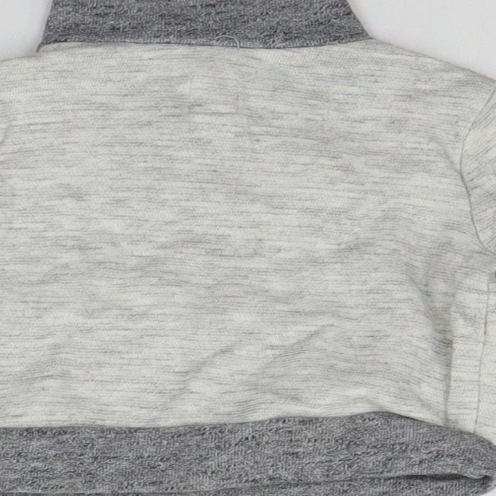 Brand and care label for Gap Baby Grey jumper, size 0-3, Months