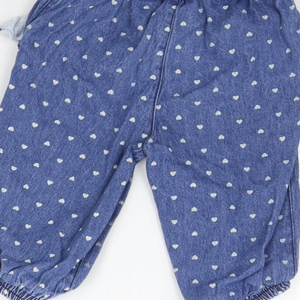 Brand and care label for Baby girls’ blue jogger jeans, size 6-9, months - elasticated waist