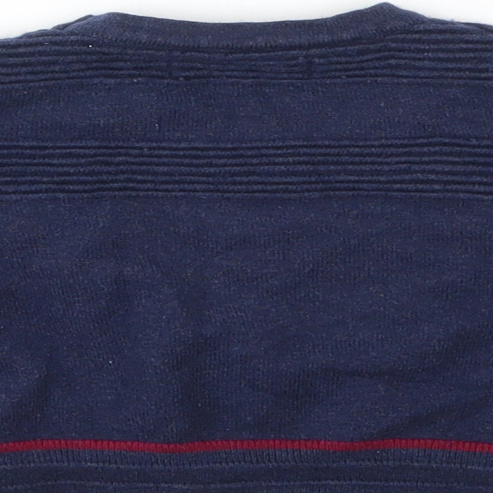 Brand and care label for Debenhams girls’ blue cardigan jumper, size 6-9, months